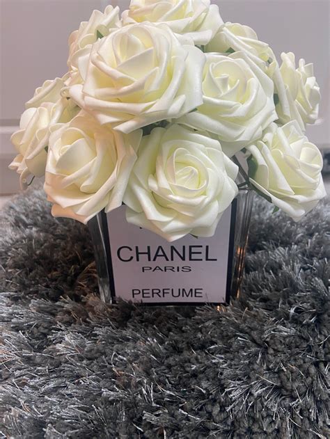 creme chanel camelia|chanel vase with flowers.